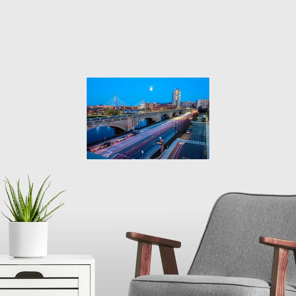 A modern room featuring Photo of the Charles River Dam Road with Leonard P. Zakim Bunker Hill Bridge in view.