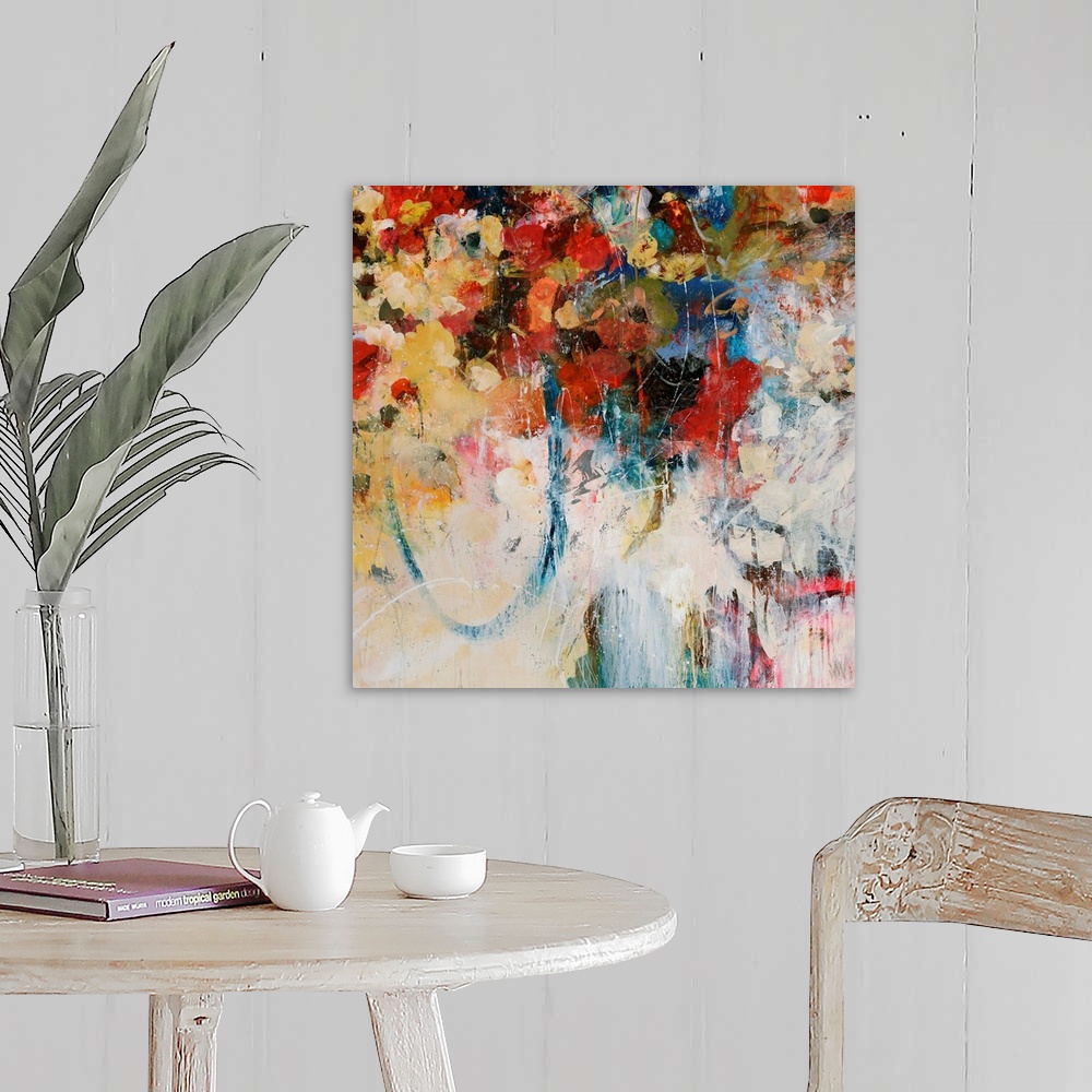 A farmhouse room featuring Abstractly painted square canvas with different flowers painted in the top portion and faded colo...