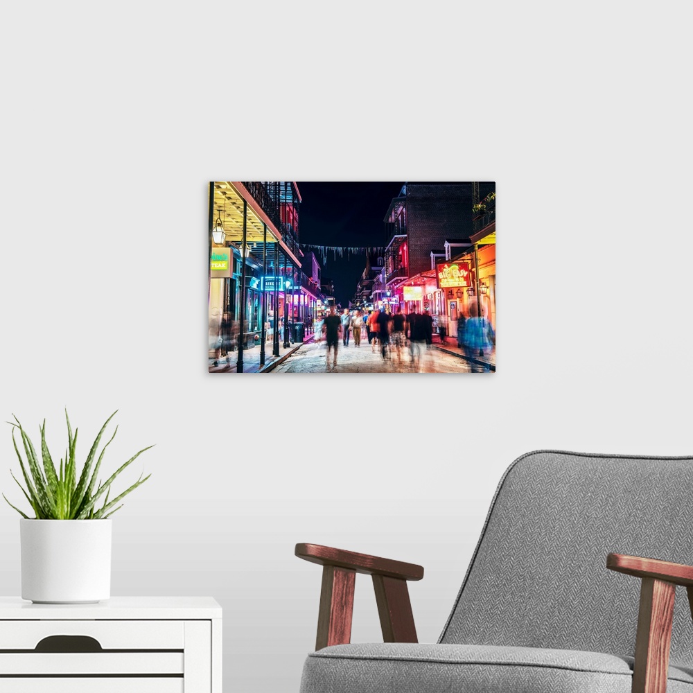 A modern room featuring Snapshot of Bourbon street at night in New Orleans, Louisiana.