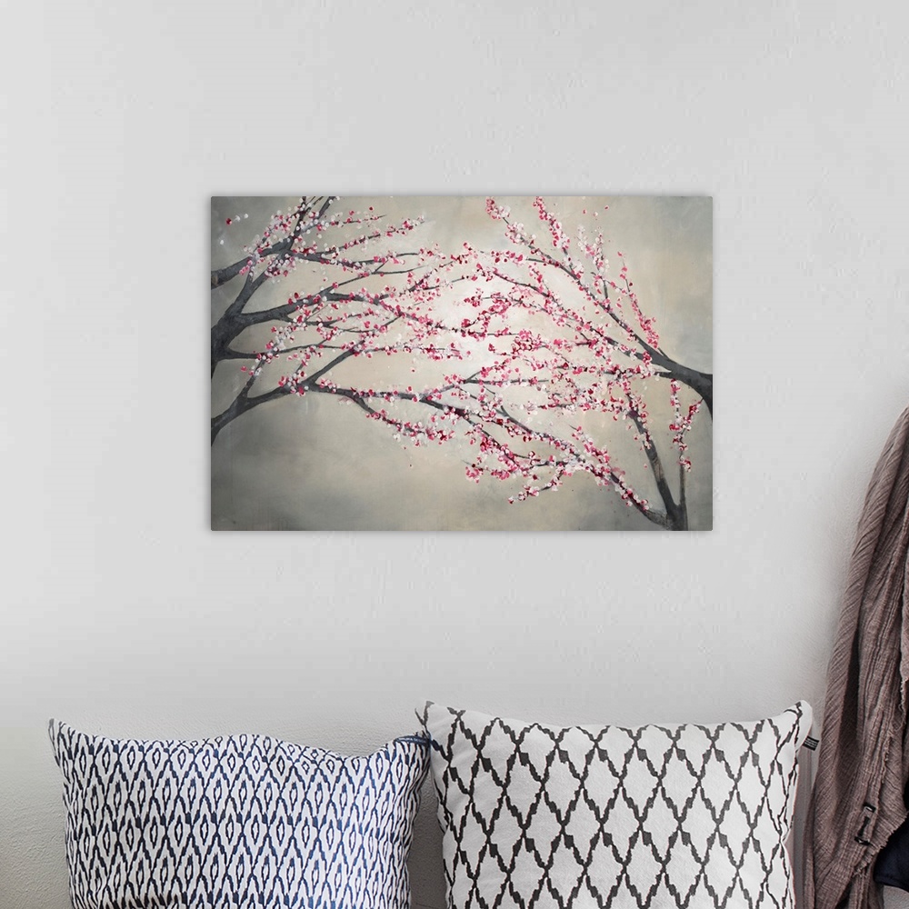 A bohemian room featuring Contemporary painting of blossom covered tree branches on the right and left of the image, that a...