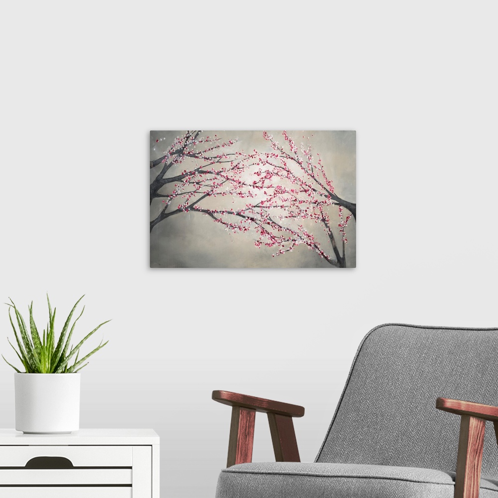 A modern room featuring Contemporary painting of blossom covered tree branches on the right and left of the image, that a...