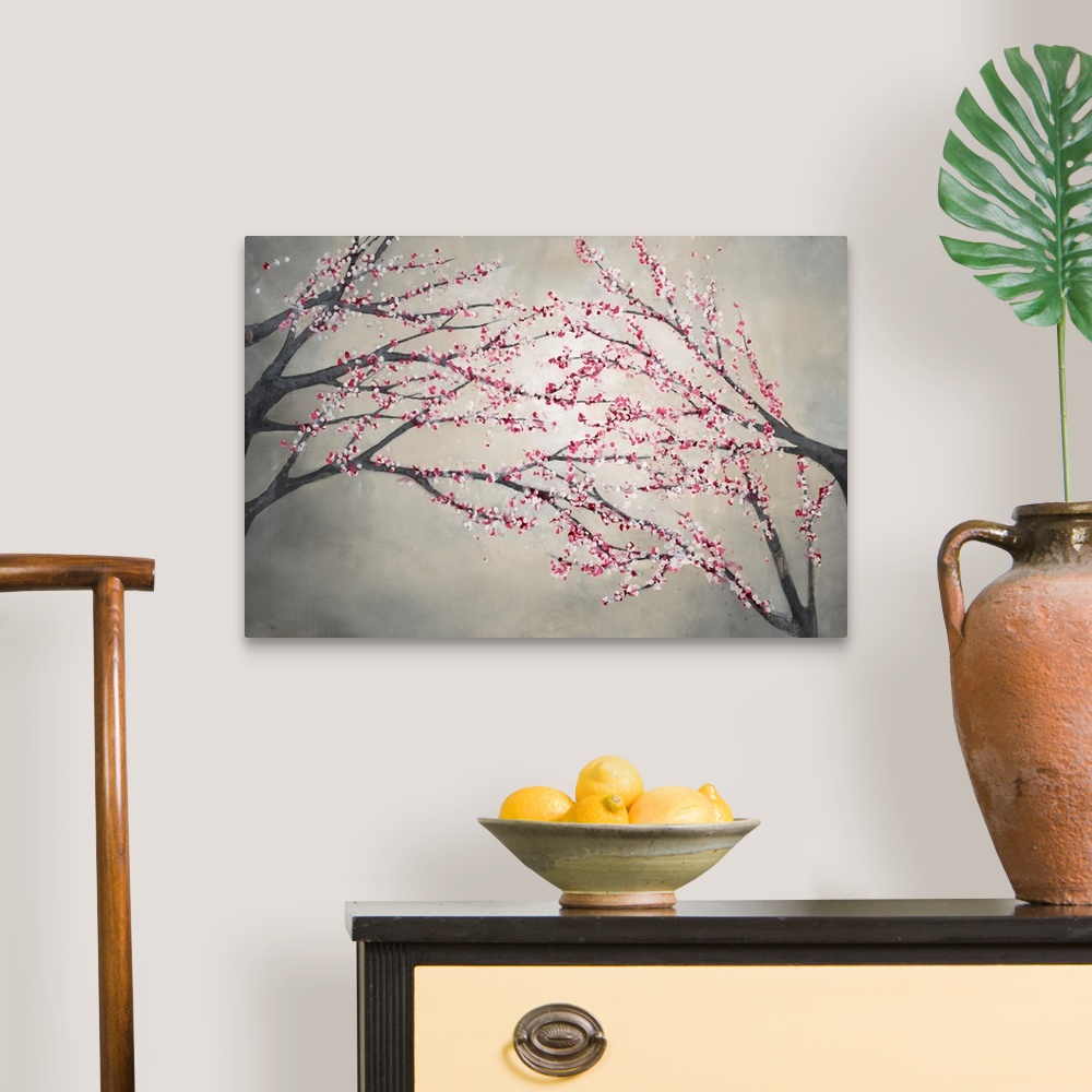 A traditional room featuring Contemporary painting of blossom covered tree branches on the right and left of the image, that a...