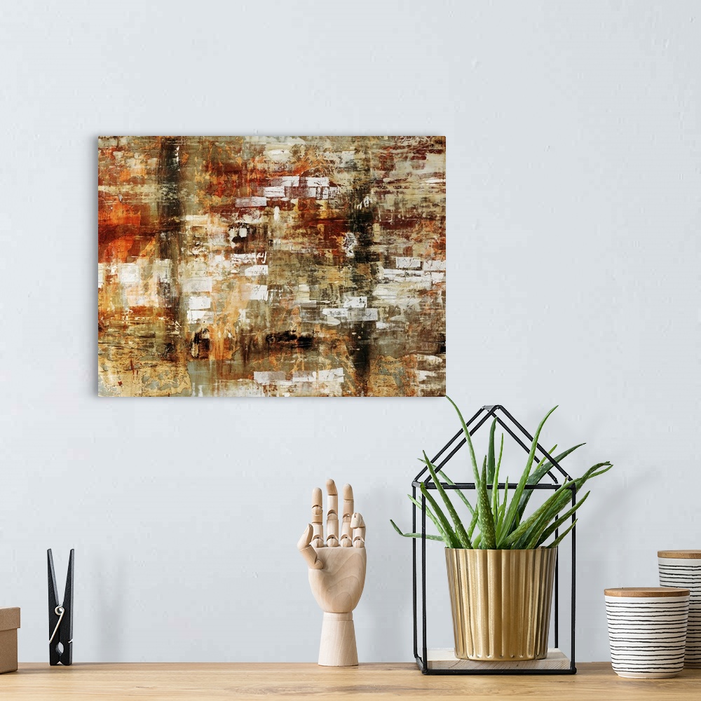 A bohemian room featuring Grungy abstract painting of various earth toned colors on canvas.
