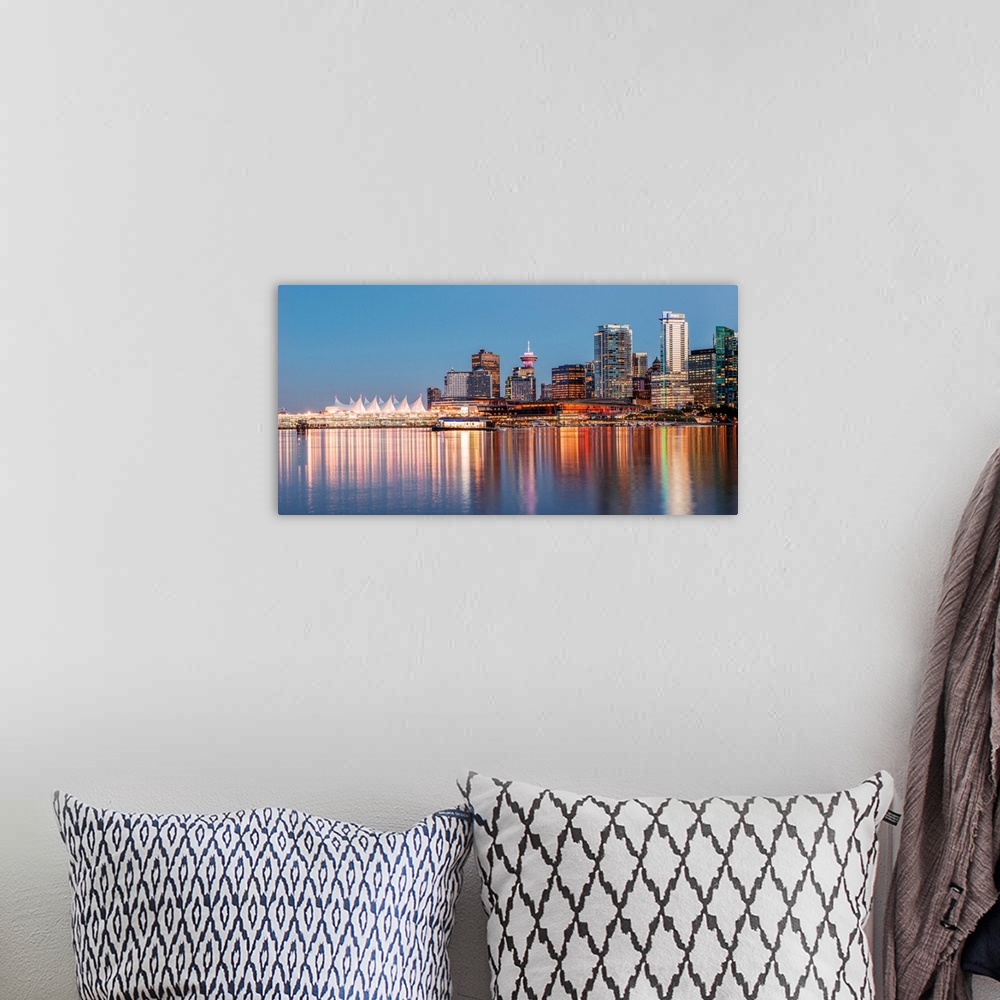 A bohemian room featuring Bright reflections of Vancouver skyline during sunset in British Columbia, Canada.