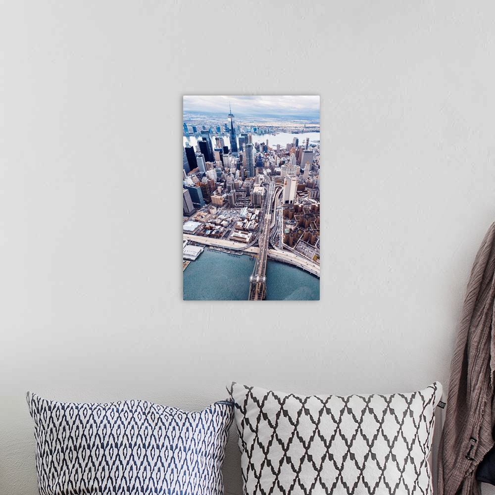 A bohemian room featuring Aerial view of the Brooklyn Bridge leading into the city, New York City.
