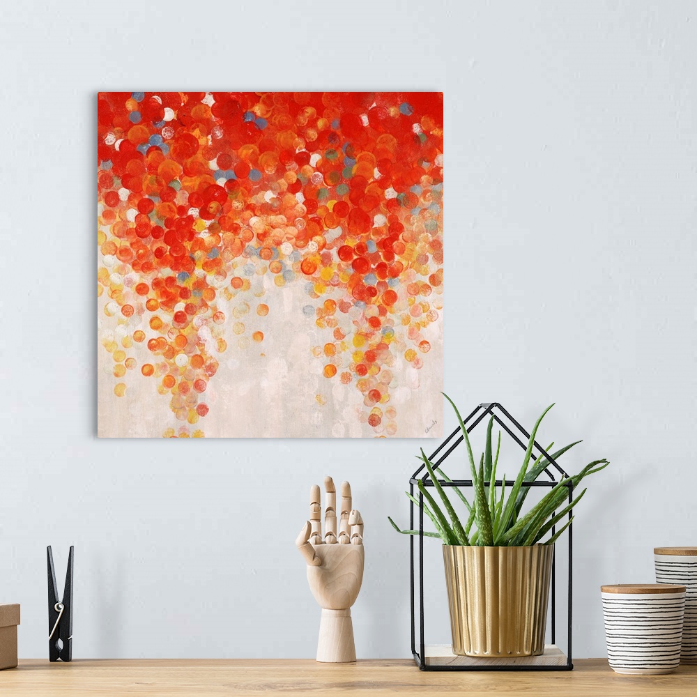 A bohemian room featuring Abstract painting of a large cluster of gumballs in warm tones that appear to be raining downward...