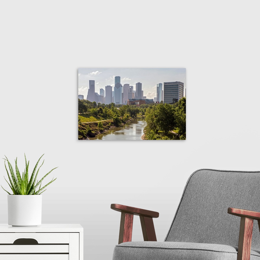 A modern room featuring Photograph of the Houston TX skyline viewed from Buffalo Bayou Park.