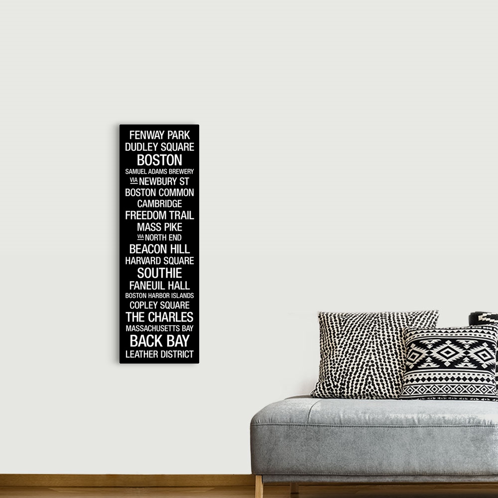 A bohemian room featuring Vertical, typographic artwork listing landmarks and popular places in this New England metropolis.