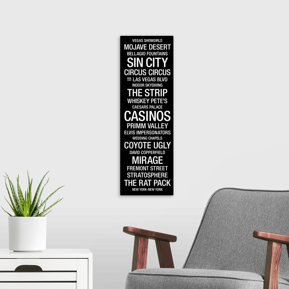 A modern room featuring A vertical bus roll featuring a list of many of the landmarks and icons that the city of Las Vega...