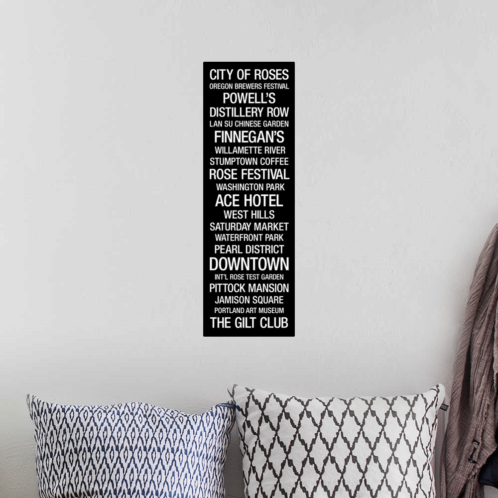 A bohemian room featuring Bus Roll style text highlighting roads, buildings, and festivals that can be found in Portland, O...