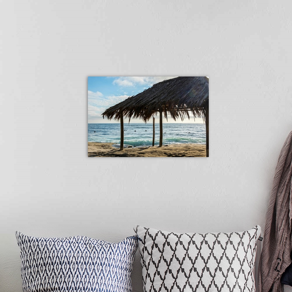 A bohemian room featuring Photograph of a cabana made with natural materials on the shore of Windansea Beach, San Diego on ...