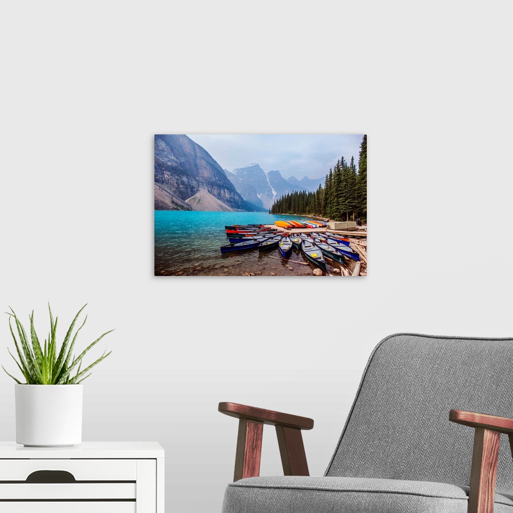 A modern room featuring Canoes at Moraine Lake in Banff National Park, Alberta, Canada.