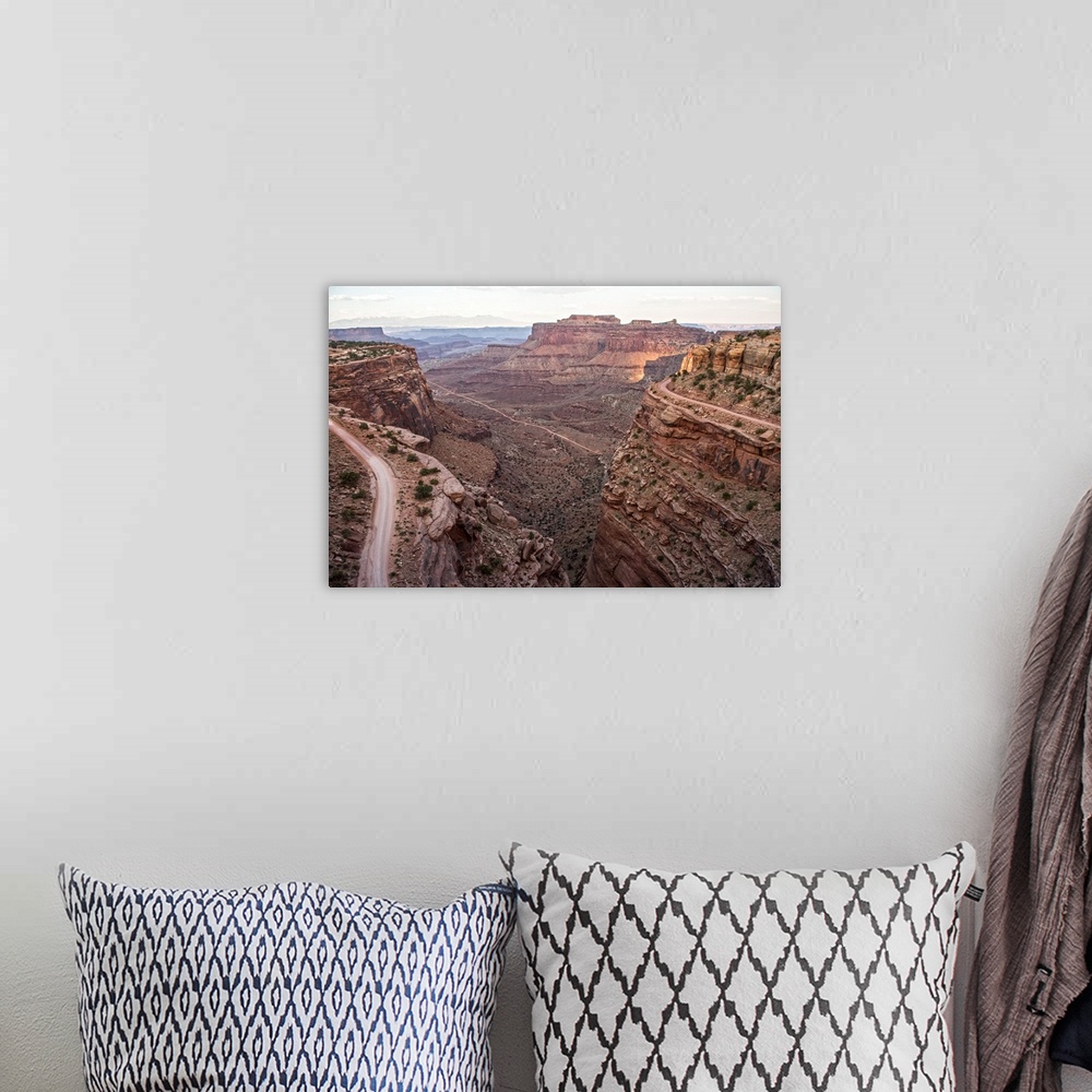 A bohemian room featuring View of the rocky desert landscape with mesas in the distance, seen from Shafer Trail in Canyonla...