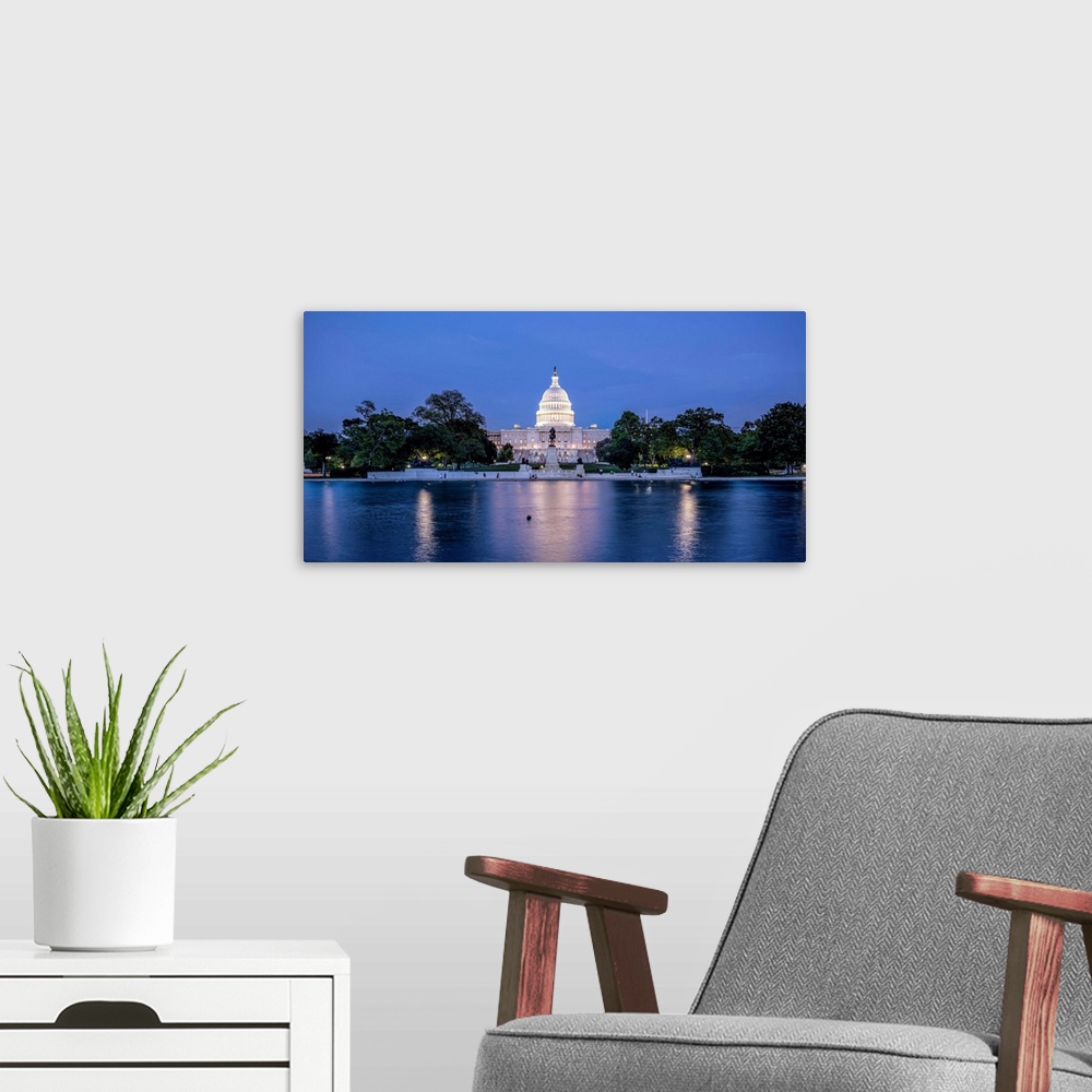 A modern room featuring Capitol Reflecting Pool At Night in front of US Capitol Building in Washington DC.