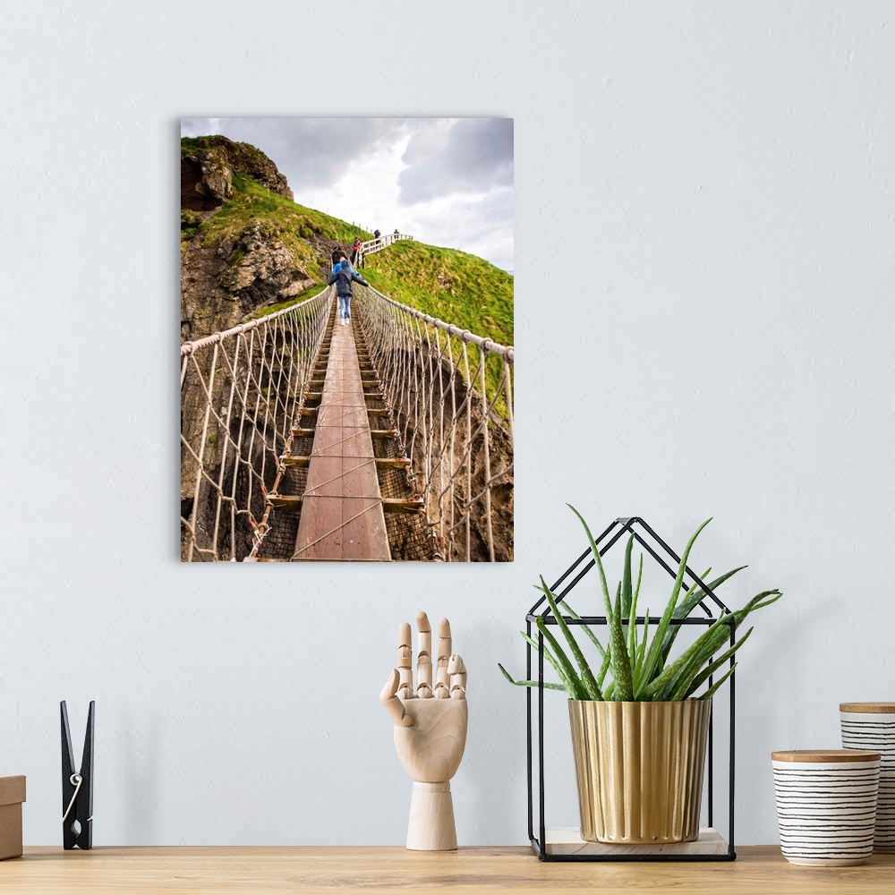 A bohemian room featuring Photograph with people walking across the County Antrim, Northern Ireland near the Giant's Causew...