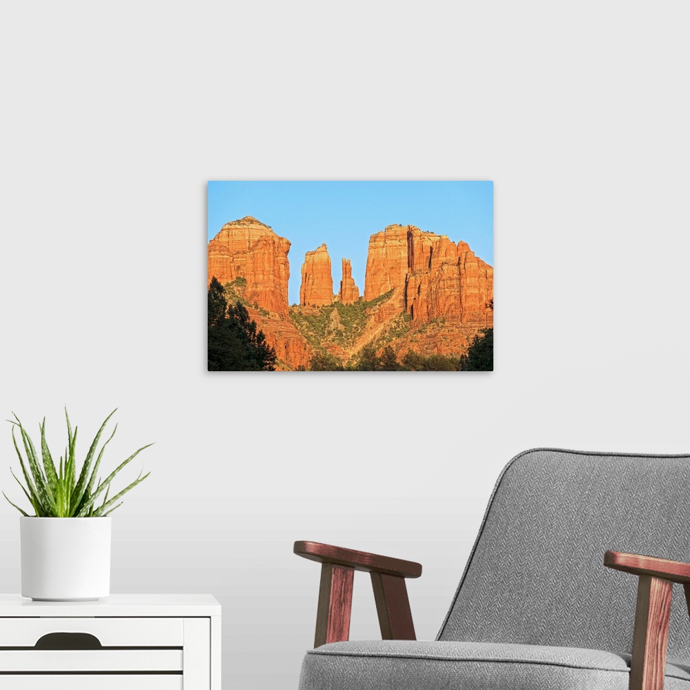 A modern room featuring Landscape phonograph of the well known Cathedral Rock in Sedona, AZ.