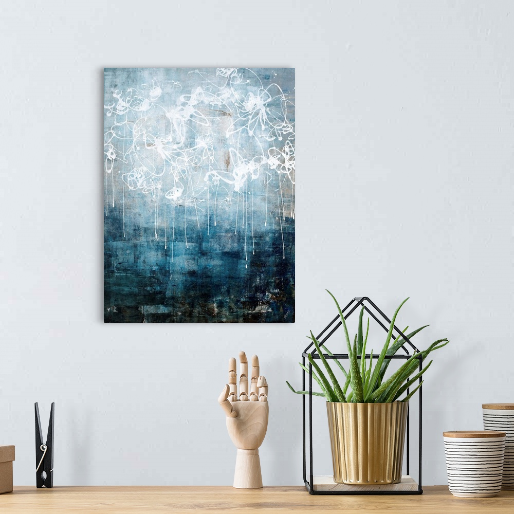 A bohemian room featuring Contemporary abstract painting using neutral tones and dark blue tones with scribbled white paint...