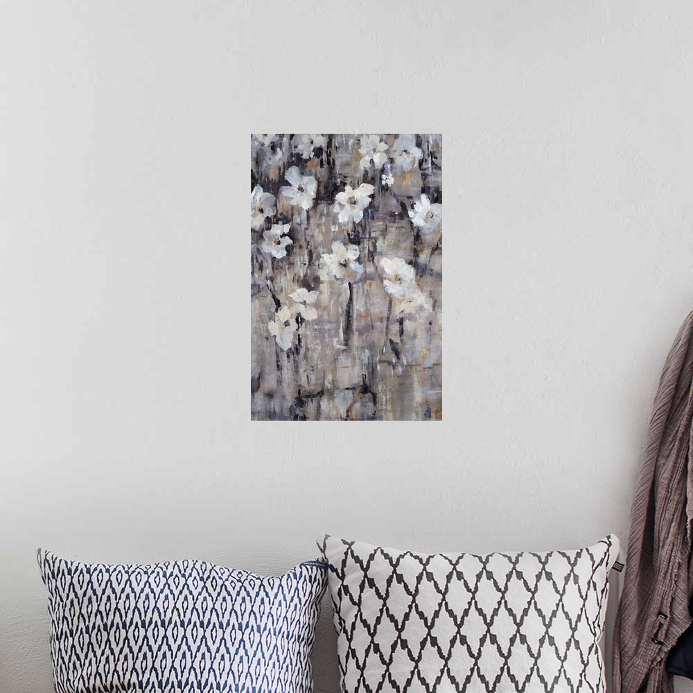 A bohemian room featuring Contemporary painting of gray-toned florals.