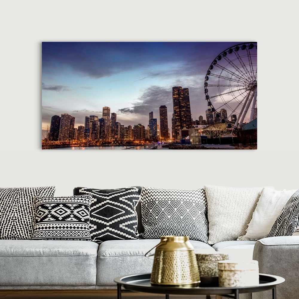 A bohemian room featuring View of the Chicago city skyline illuminated in the early evening with a Ferris Wheel in the fore...