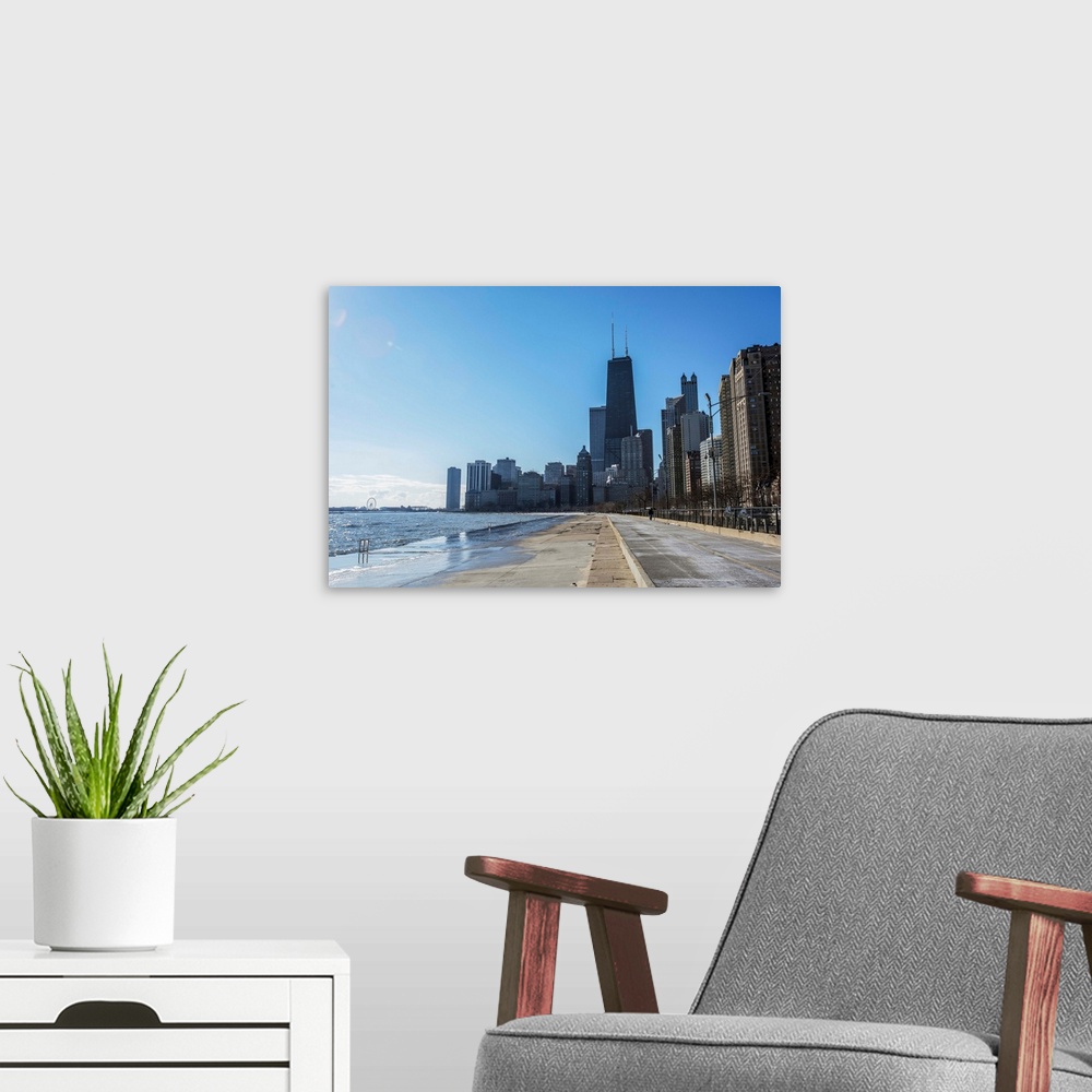 A modern room featuring Photo of Chicago skyline from the Concrete Beach.