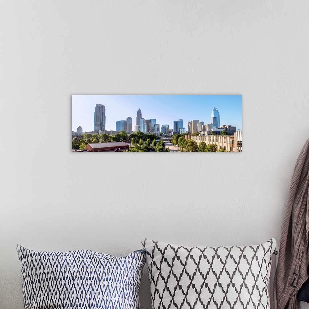 A bohemian room featuring Horizontal image of Charlotte, NC with a blue sky/
