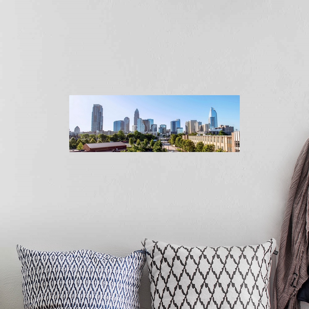 A bohemian room featuring Horizontal image of Charlotte, NC with a blue sky/