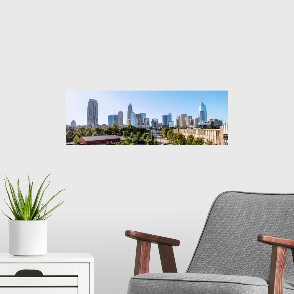 A modern room featuring Horizontal image of Charlotte, NC with a blue sky/