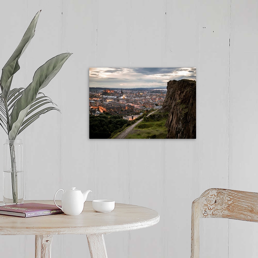 A farmhouse room featuring Photograph of the city of Edinburgh, Scotland lit up at sunset with a view from Holyrood Park.