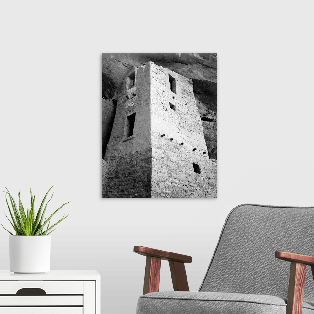 A modern room featuring Cliff Palace, Mesa Verde National Park, vertical of tower, taken from above.