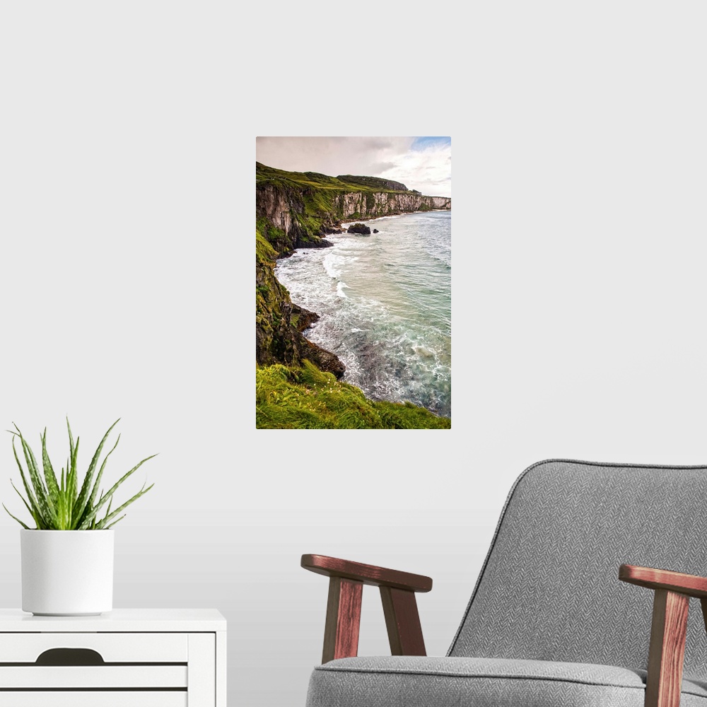 A modern room featuring Landscape photograph of the picturesque Cliffs of Moher, located at the southwestern edge of the ...