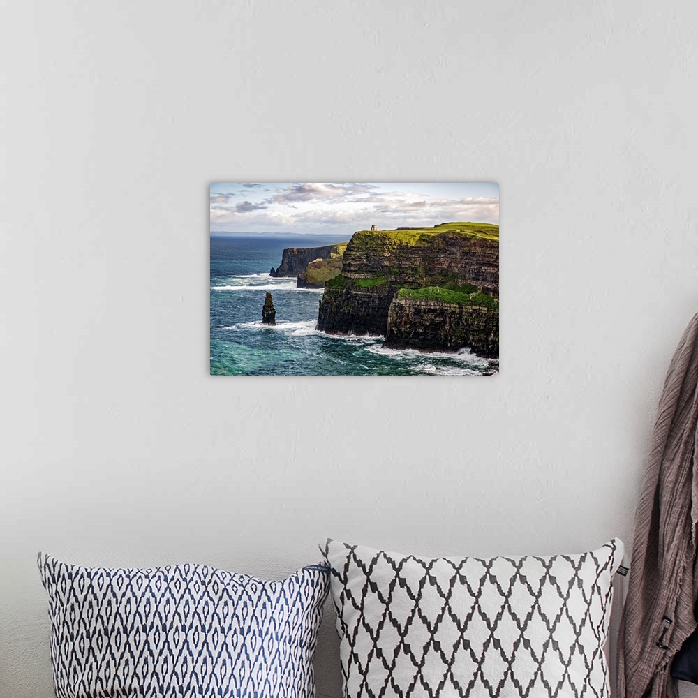 A bohemian room featuring Photograph of the Cliffs of Moher with O'Brien's Tower seen in the distance, marking the highest ...