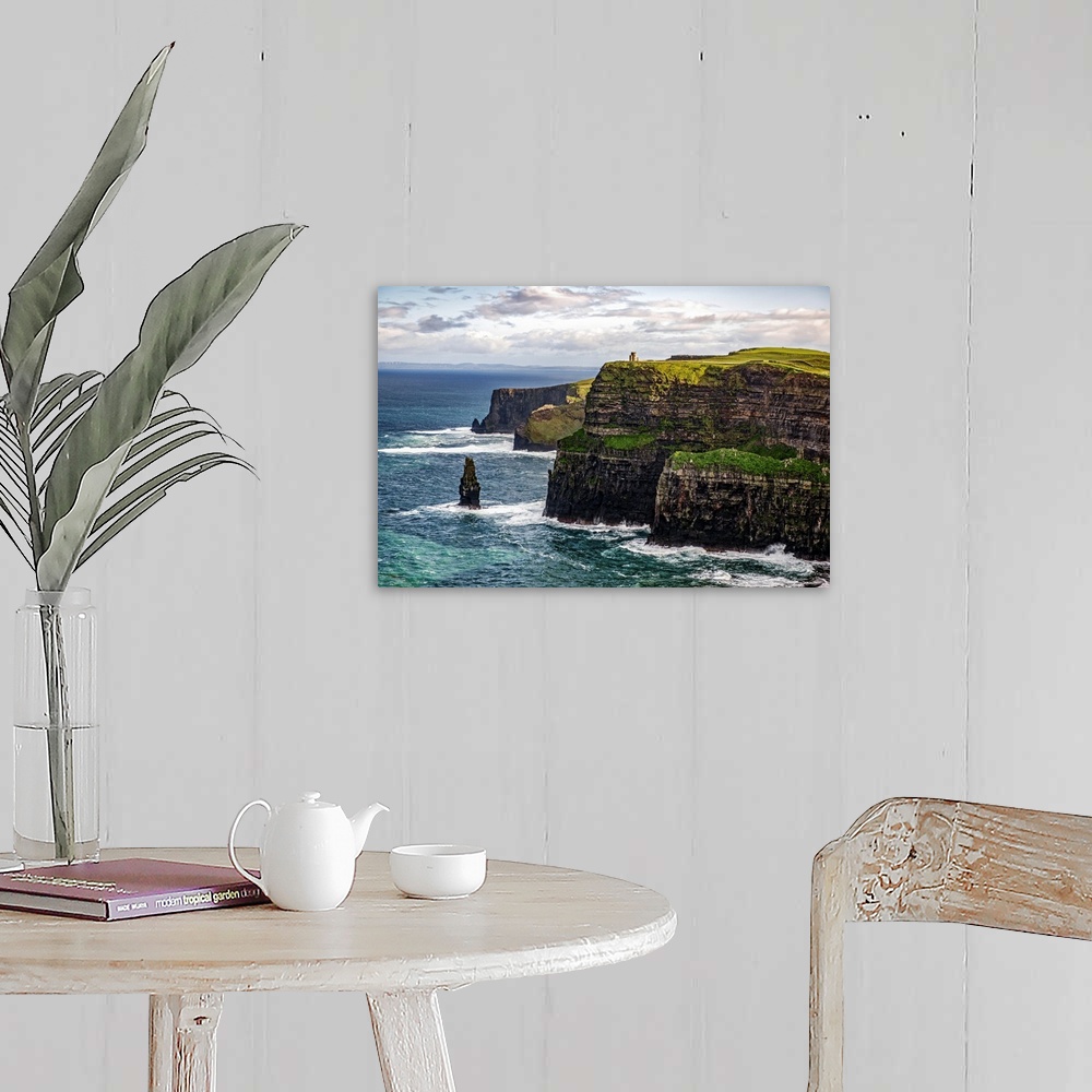 A farmhouse room featuring Photograph of the Cliffs of Moher with O'Brien's Tower seen in the distance, marking the highest ...
