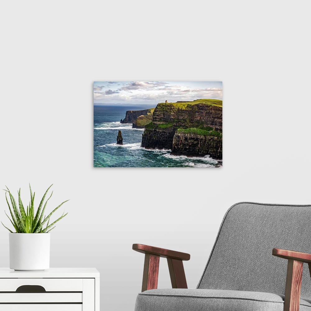 A modern room featuring Photograph of the Cliffs of Moher with O'Brien's Tower seen in the distance, marking the highest ...