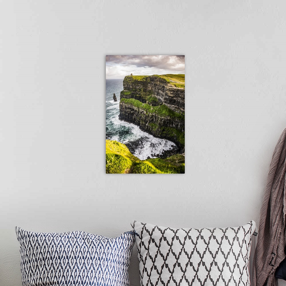 A bohemian room featuring Photograph of O'Brien's Tower, marking the highest point of the Cliffs of Moher in Ireland.