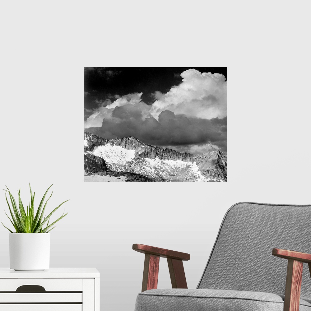 A modern room featuring Clouds - White Pass.