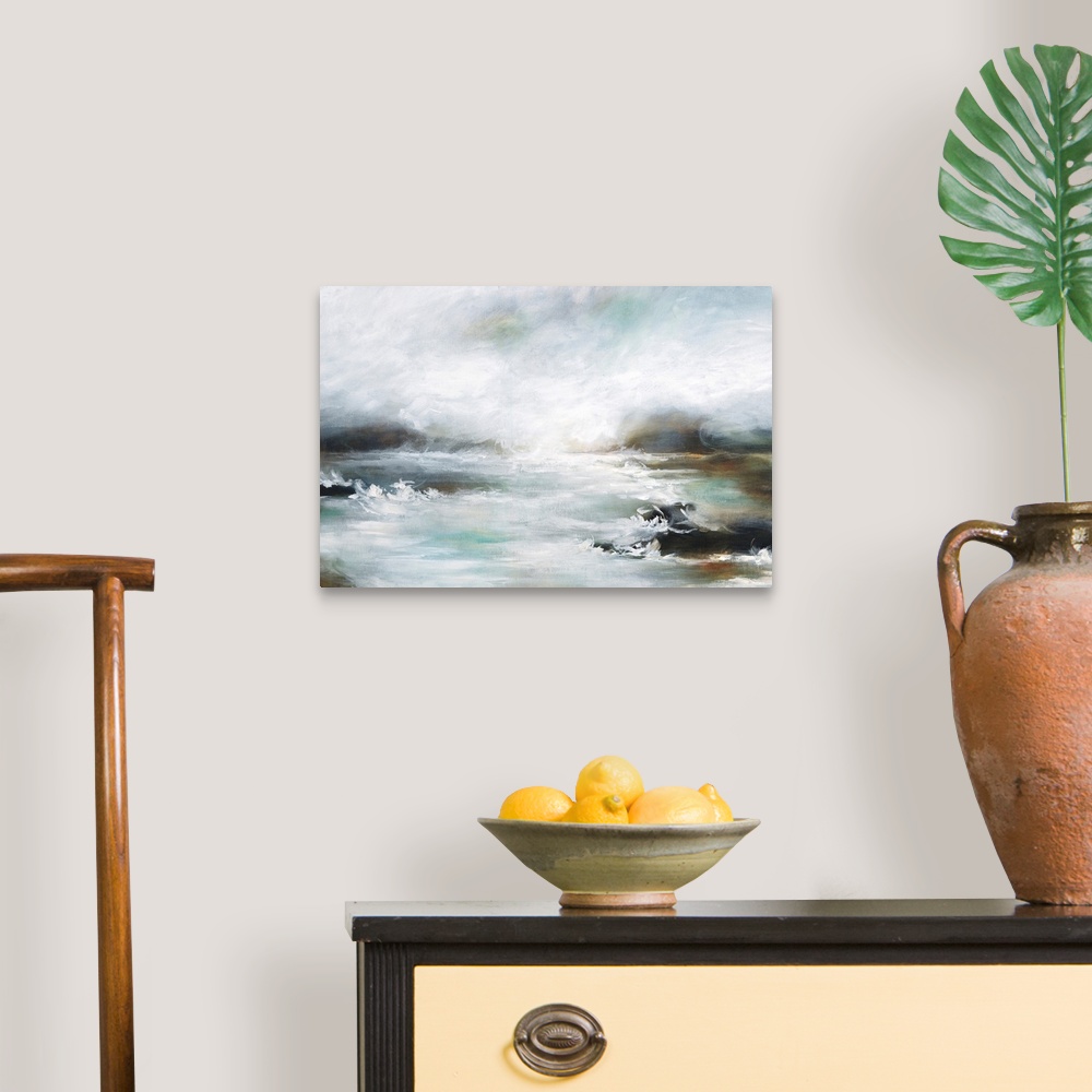 A traditional room featuring Contemporary artwork of a seascape with mild waves on a cloudy day.