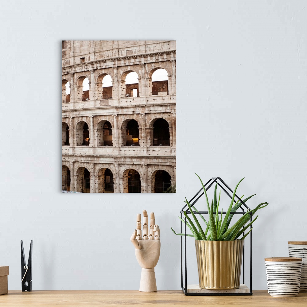 A bohemian room featuring Detailed photograph of the Colosseum walls in Rome.