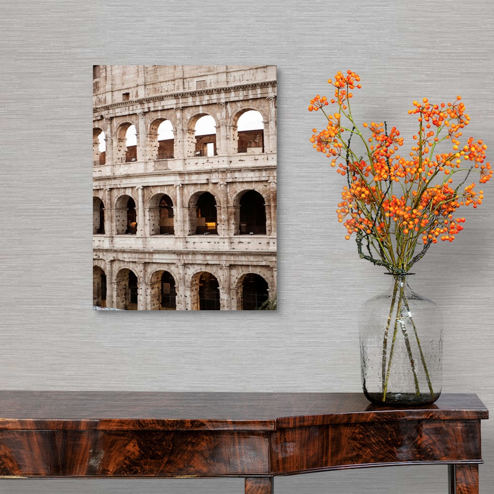 A traditional room featuring Detailed photograph of the Colosseum walls in Rome.