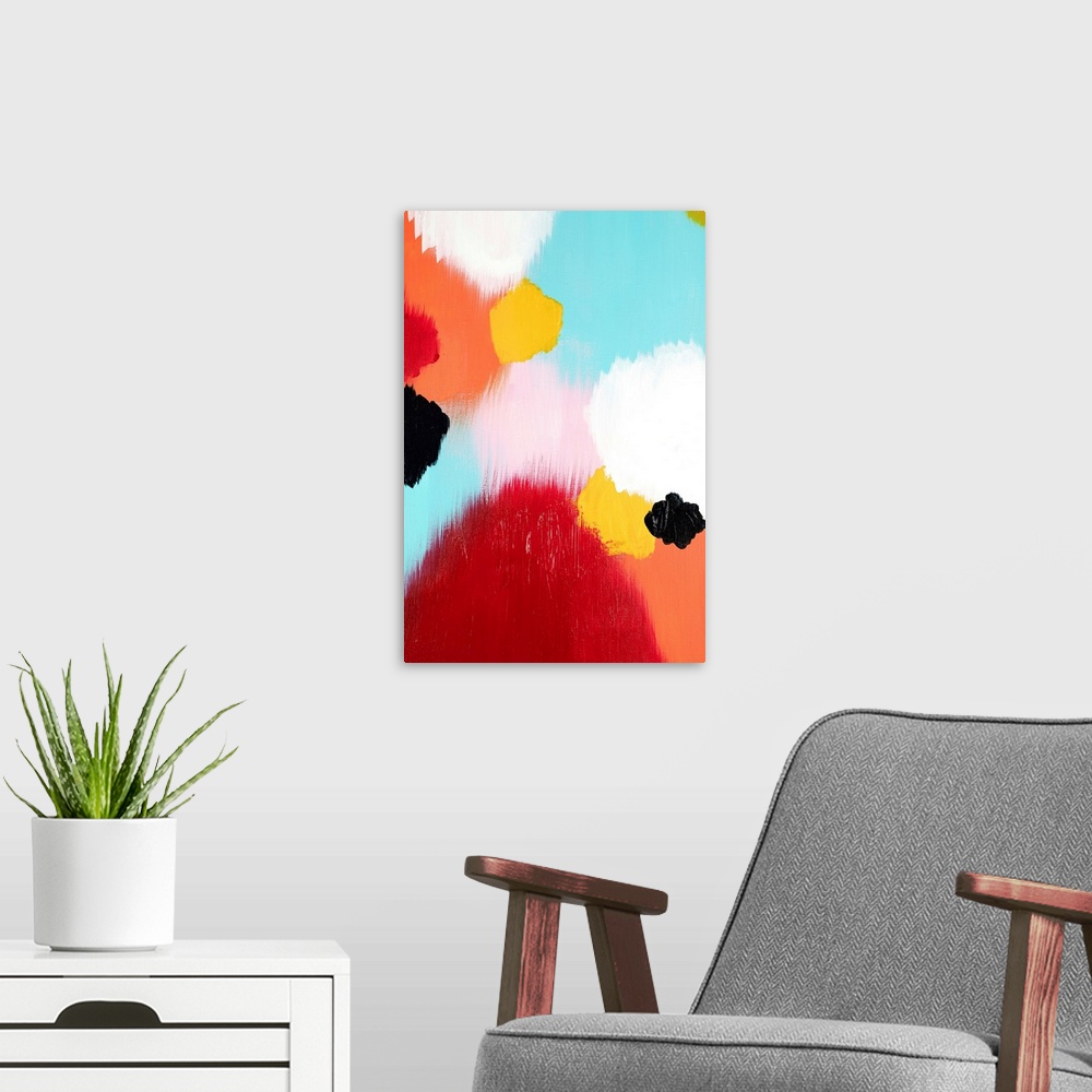 A modern room featuring Abstract painting of soft, large circles in bright colors.