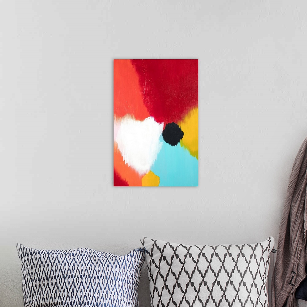 A bohemian room featuring Abstract painting of soft, large circles in bright colors.