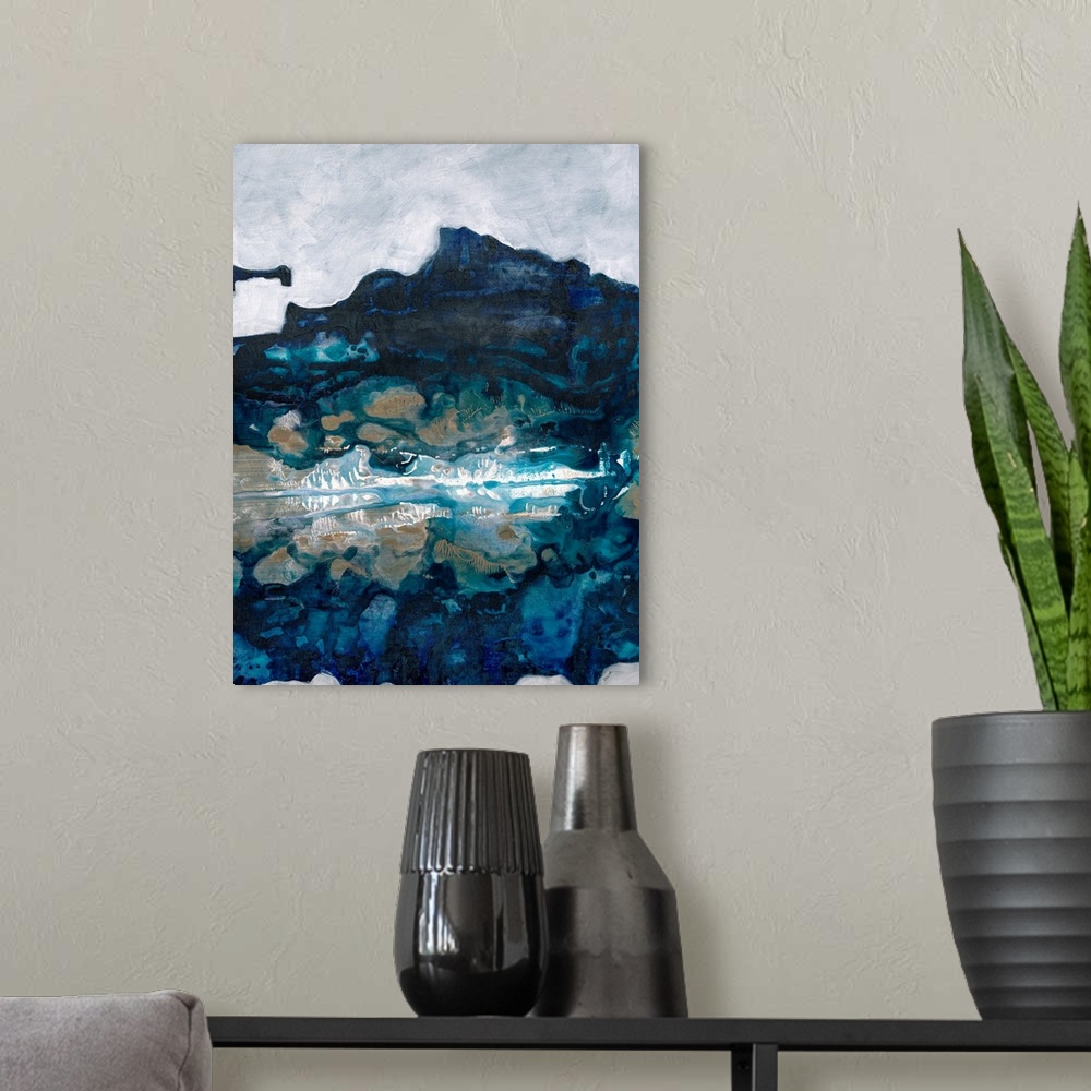 A modern room featuring Contemporary painting of blue forms mimicking a cool natural landscape, such as a lake or mountain.