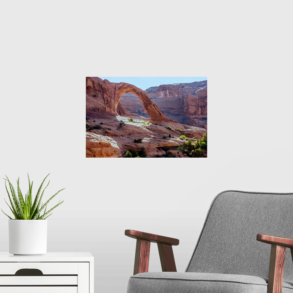 A modern room featuring Corona Arch over looking the desert landscape of Bootlegger Canyon in Arches National Park, Utah