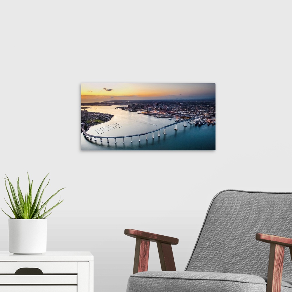 A modern room featuring Aerial view of the Coronado Bridge in San Diego, California, at sunset.
