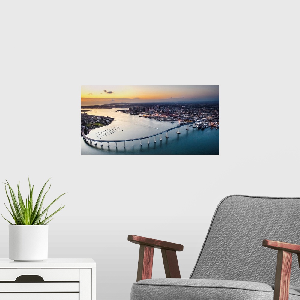 A modern room featuring Aerial view of the Coronado Bridge in San Diego, California, at sunset.