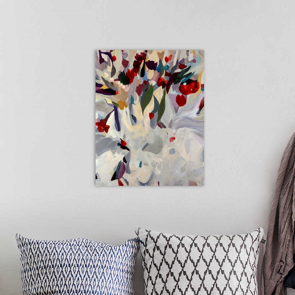 A bohemian room featuring Large abstract modern painting of a uniquely arranged bouquet of blooming flowers. Vibrant tones ...