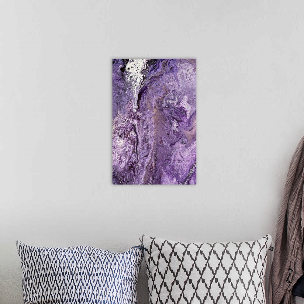 A bohemian room featuring Abstract contemporary painting in brown, white and purple tones, in a marbling effect.