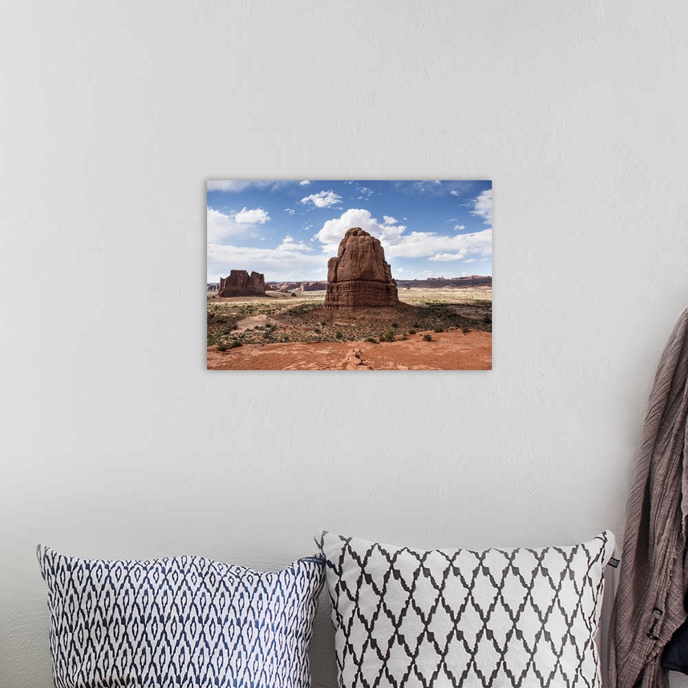 A bohemian room featuring Sandstone formations, the Courthouse Towers, in the desert landscape of Arches National Park, Utah.