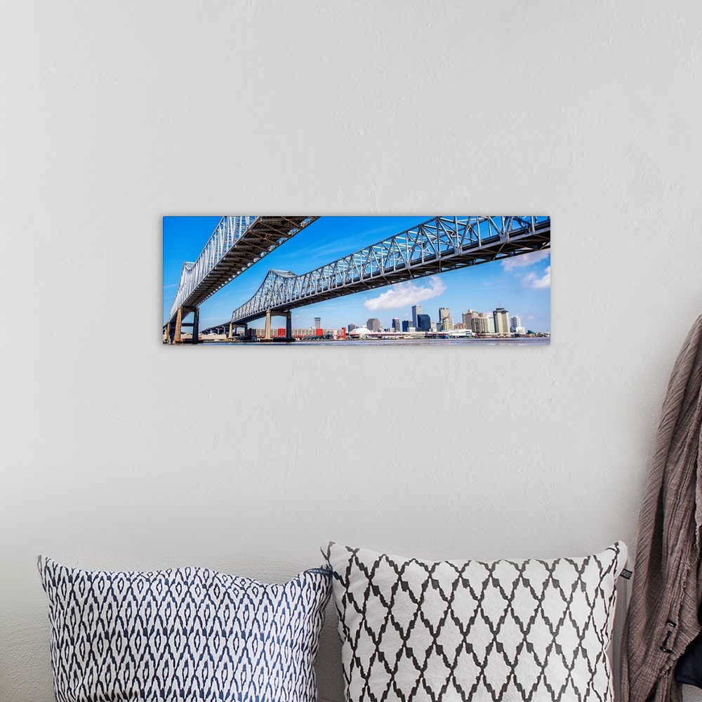 A bohemian room featuring Panoramic photograph of the Crescent City Connection, formerly the Greater New Orleans Bridge, tw...