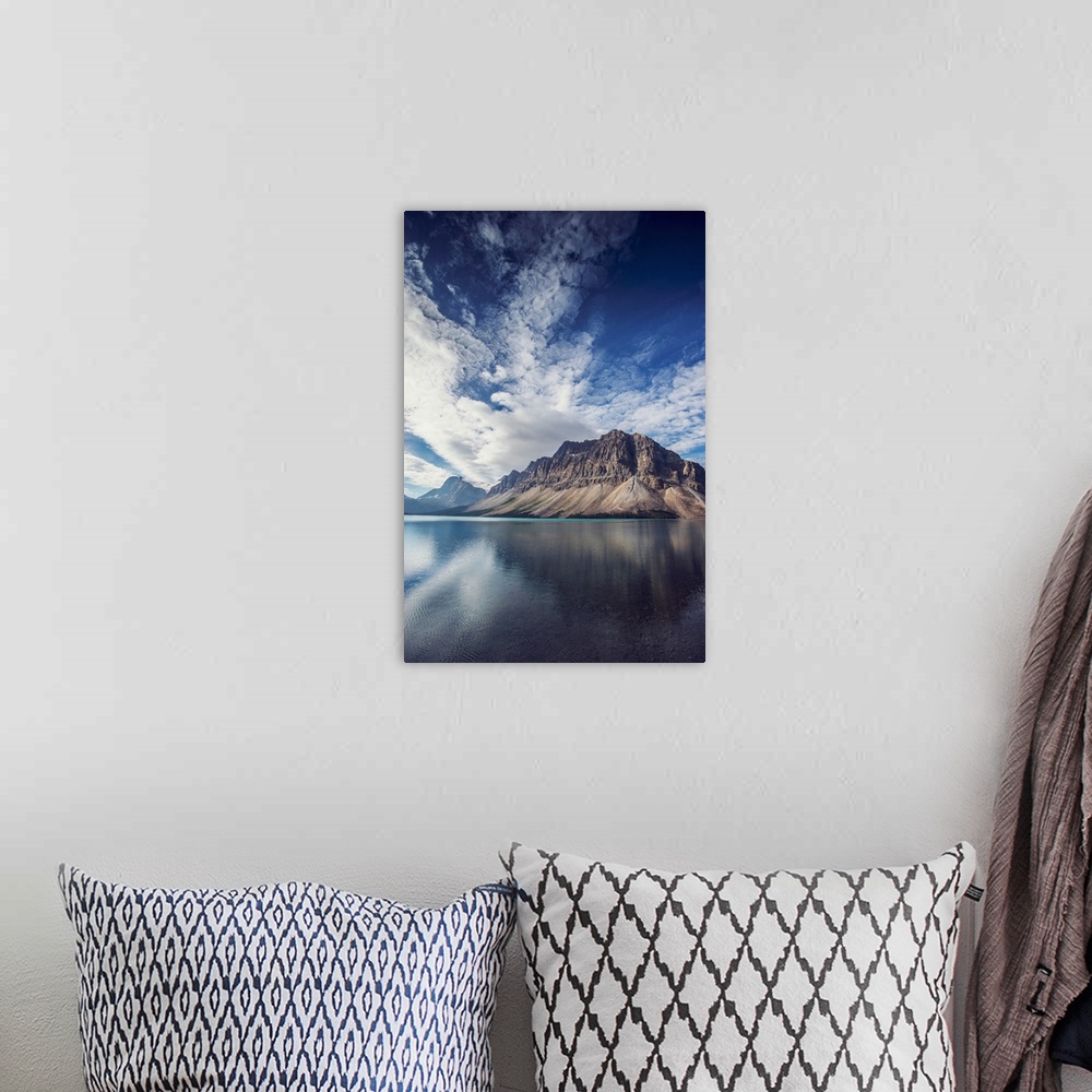 A bohemian room featuring Crowfoot mountain and blue skies near Bow Lake in Banff National Park, Alberta, Canada.