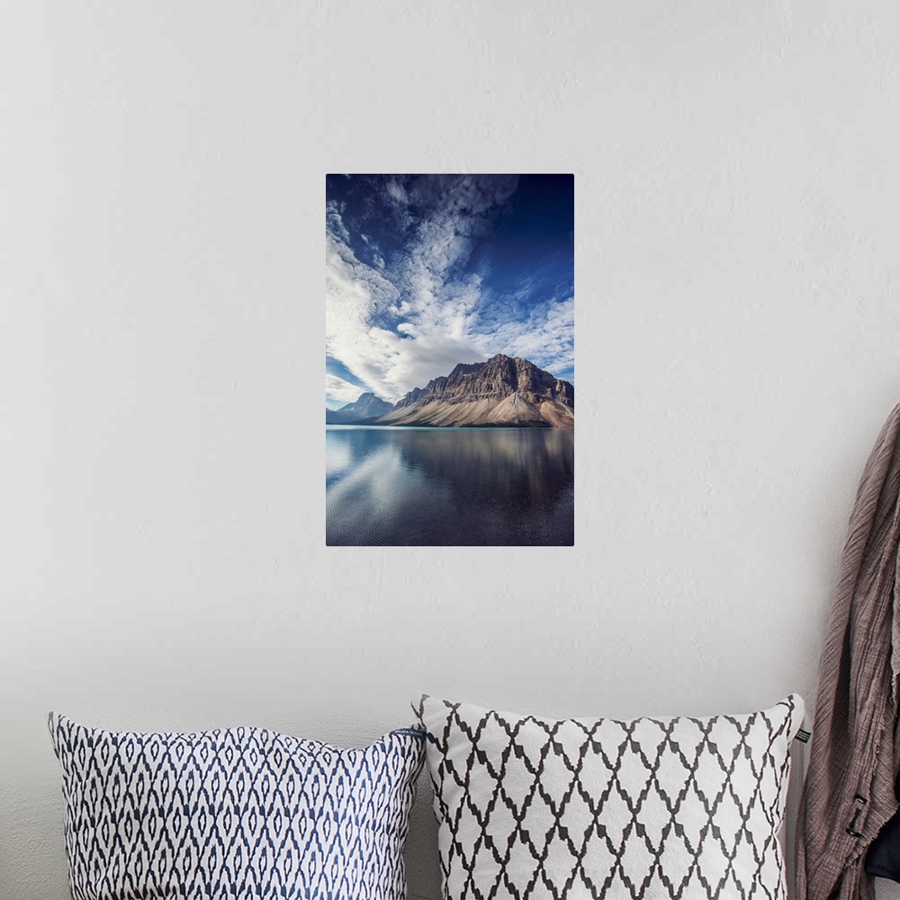 A bohemian room featuring Crowfoot mountain and blue skies near Bow Lake in Banff National Park, Alberta, Canada.